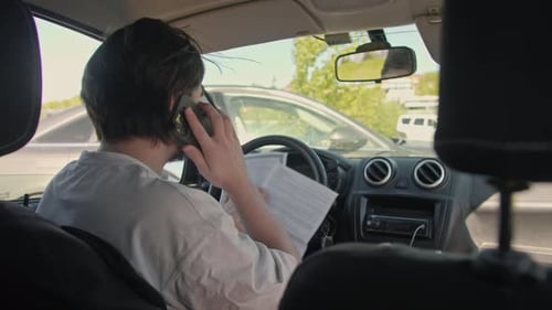 Man Who Was Involved in the Accident is Sitting Behind the Wheel Trying to Figure Out What to Do