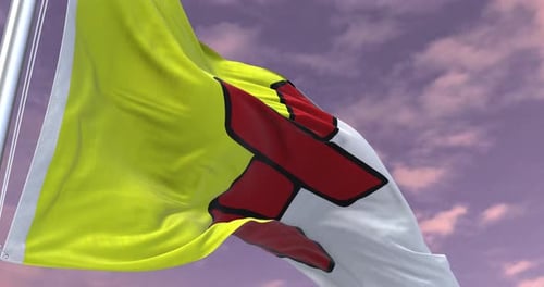 Realistic Yellow Red White Flag Waving in Wind Against Purple Sky