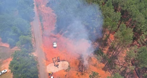 Burning the Uprooted Forest on the Construction Site for the Construction to Build Houses is Taking