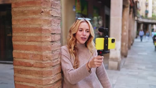 Influencer filming travel content in european city