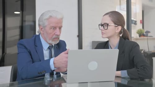 Business Meeting with Laptop in Bright Modern Office