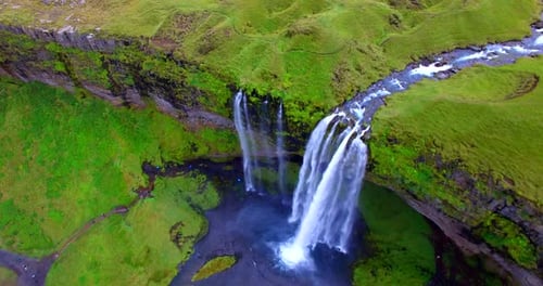 Drone footage of a waterfall in Iceland