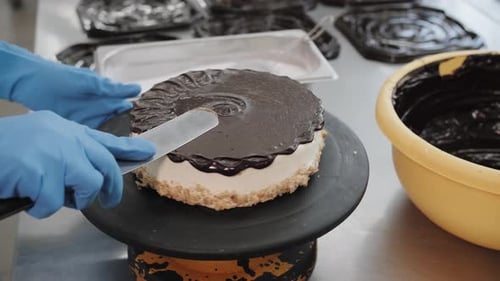 Professional Decorating a Layer Cake with Chocolate Frosting