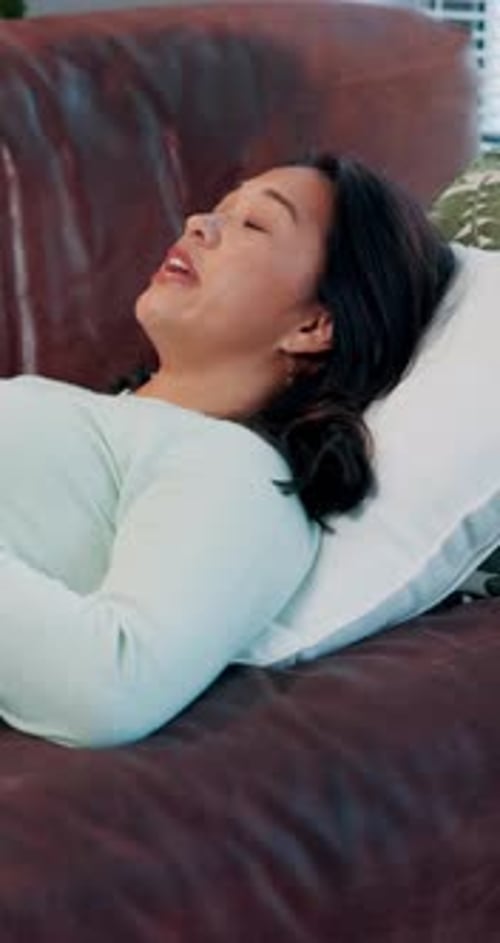 Therapy, woman and talking on sofa for consultation, mental health and anxiety support in office