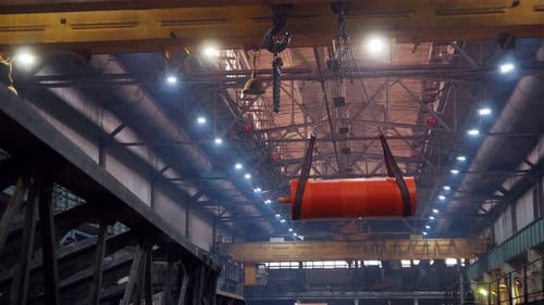 Industrial Concept A Crane Lifting on a Big Orange Detail