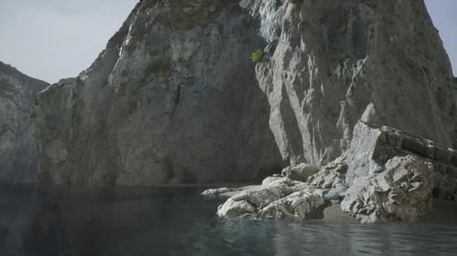 Serene Rocky Coastline with Calm Waters at Midday Light