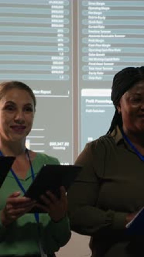 Vertical Video Portrait of Team Members Discuss Insight Details and Progress on a New Project