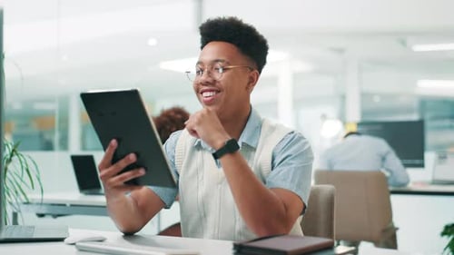 Happy man, web designer and research with tablet for app development or UX and UI testing at office