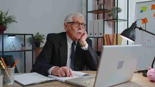 Senior Business Office Man Analyzes Financial Charts Celebrate Success Win at Home Workplace Desk