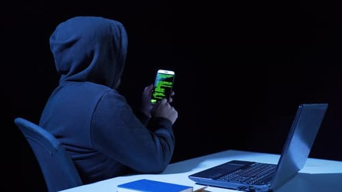 Hacker works from phone.