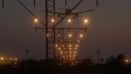 Airplane on Final Approach at Dusk Detailed Airport Runway Lights in View