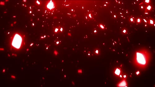 Rotes Konfetti, das auf einem schwarzen Hintergrund fällt