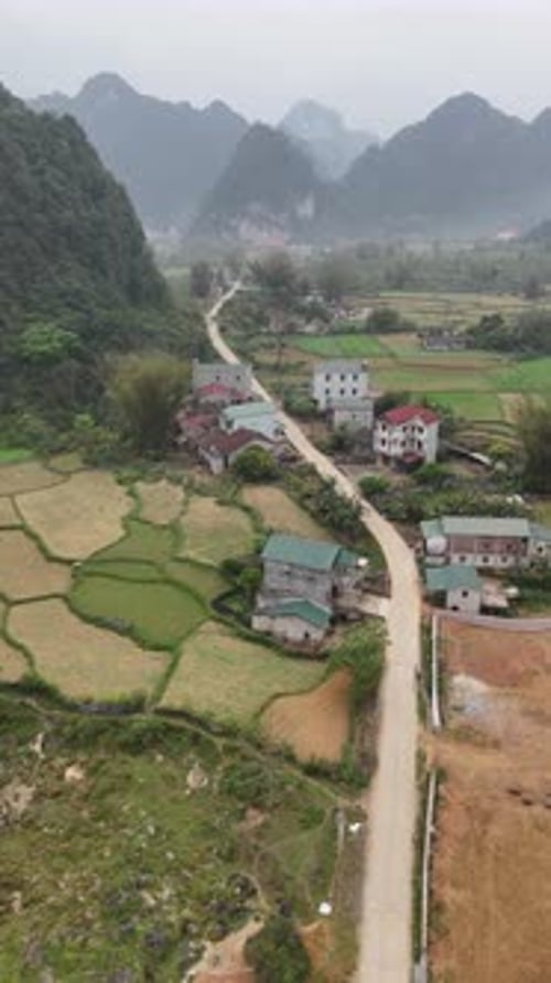 Aerial View of Rural Village Cao Bang in Vietnam with Karst Hills in background