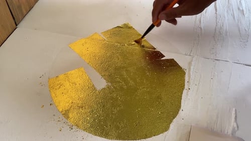 Selective Focus: Applying Gold Leaf to Canvas Wall Art