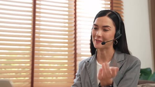 Female call center operator or customer service helpdesk staff. Blithe