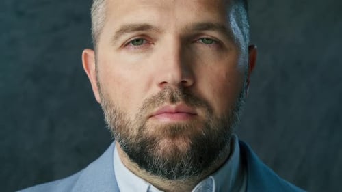 Portrait of Confident Independent Handsome Middle Aged Man Indoors Close Up