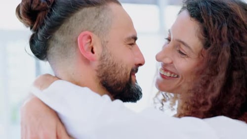 Happy Couple Embracing Affectionately in a Close Up