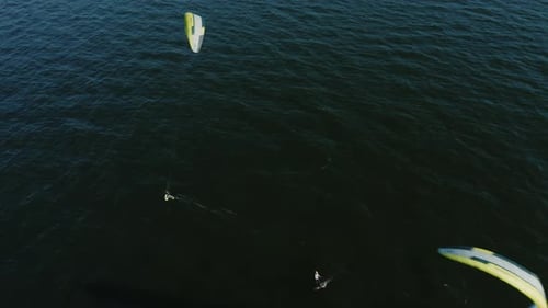 Group of Kite Surfers Doing Tricks in the Baltic Sea at Sunset Gdansk Poland