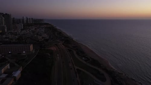 Aerial view of the city of Netanya and its coastline - part of the Israeli coastal plain, at sunset