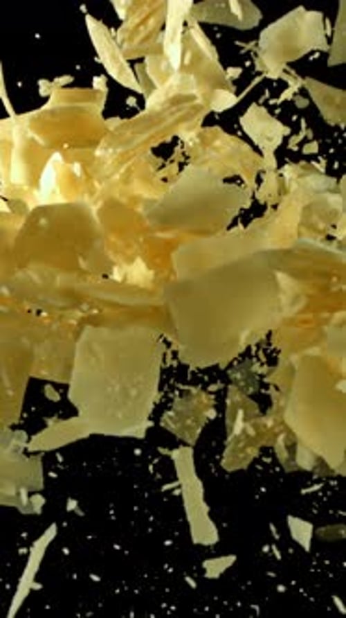Parmesan Cheese Flies Up and Falls Down Filmed on a Highspeed Camera at 1000 Fps