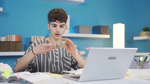 The student who takes a break from the lesson at home finds the money on the table and is surprised.