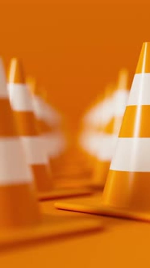 Front View Grid of Traffic Cones in Orange on a Orange Background for Road Safety and Construction
