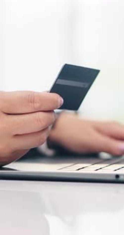 Hands, businesswoman and laptop with credit card in office for online shopping, payment or banking