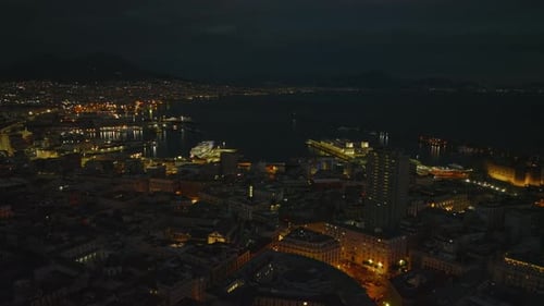 Aerial Slide and Pan Footage on Harbour at Night