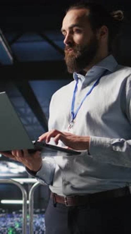 Vertical Video Data Center Admins Monitoring Artificial Intelligence LLM Visualization