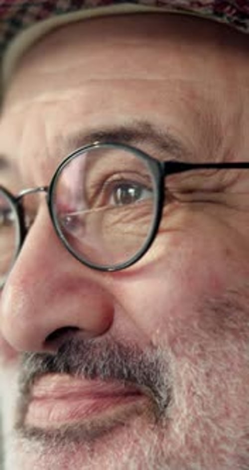 Senior man, glasses and thinking at house with dementia, remember past and retirement wellness