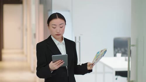 Professional Woman with Tablet and Color Swatches