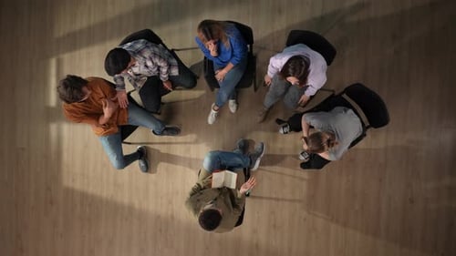 Adults Meeting in Circle From Overhead
