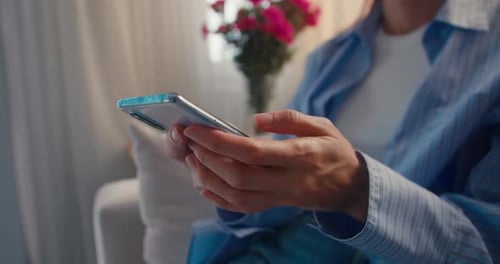Close Up Woman Hands Using Smart Phone at Home Indoor