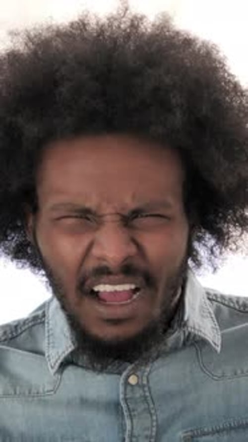 Angry Man Screaming in Studio Close-Up Portrait