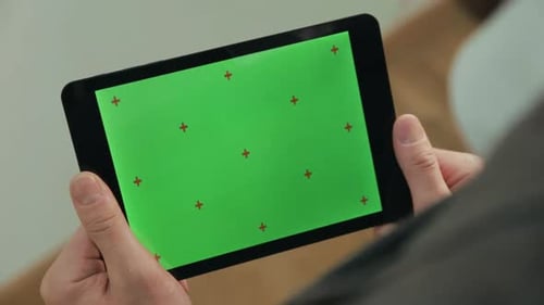 Male Finger Typing on Tablet Green Screen. Man Texting Message on Chroma