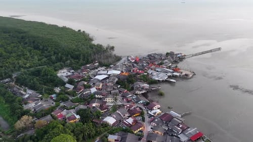 Aerial Drone Sunset Over Segenting Fishing Village, Batu Pahat Malaysia
