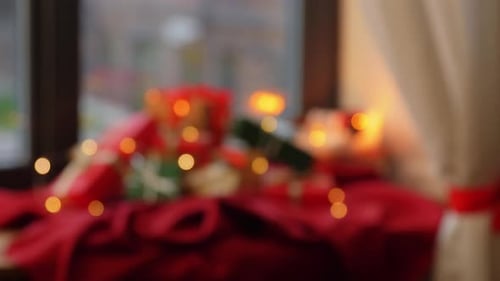 Blurred Gifts and Lights on a Window Ledge