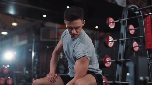 Young Sporty Man Engaged in a Gym Fitness Body Strength Exercise Fit Health Male Strong Healthy