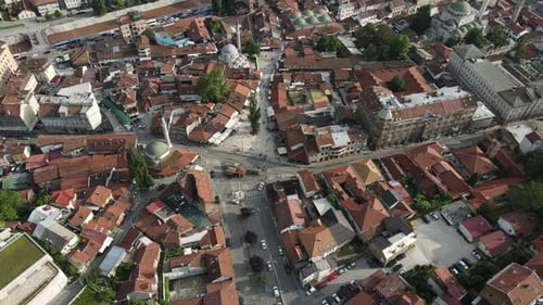 aerial view of roofed houses, view of the mosque in the city, busy streets of the city