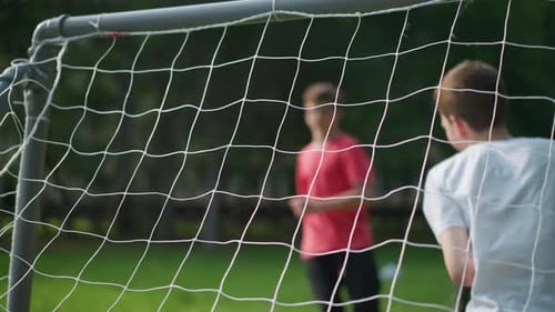 Goalkeeper Misses As Ball Hits the Net Players Clap in Celebration