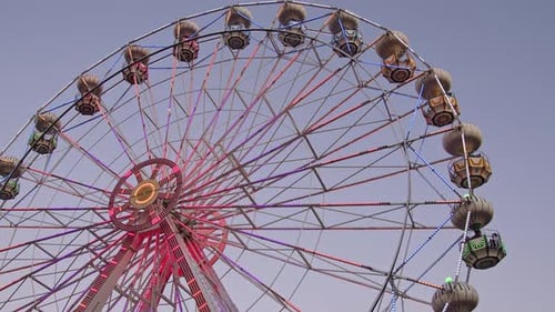 Beautiful Ferris Wheel Swing At Night In Amusement Park