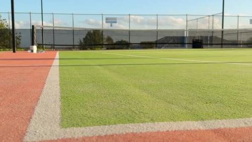 Synthetic Tennis Court Low Angle In Afternoon Sun