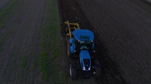 Tractor Harvesting Crops On Farm Farm Area