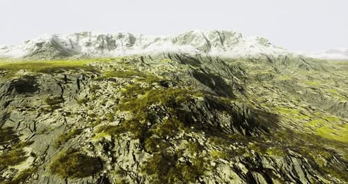 Stunning Rocky Landscape with Majestic Snow Capped Mountains in Bright Light