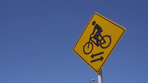 Bike Path Sign in the Park Against the Sky