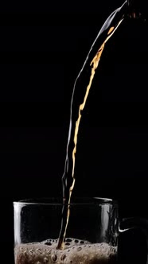 Cola Pouring with Drops and Splashes