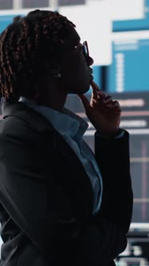 Vertical Video Business Analyst Reviewing Performance Dashboards and Financial KPIs