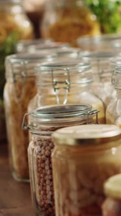 Vertical Video Eco Store Pantry Items in Reusable Jars