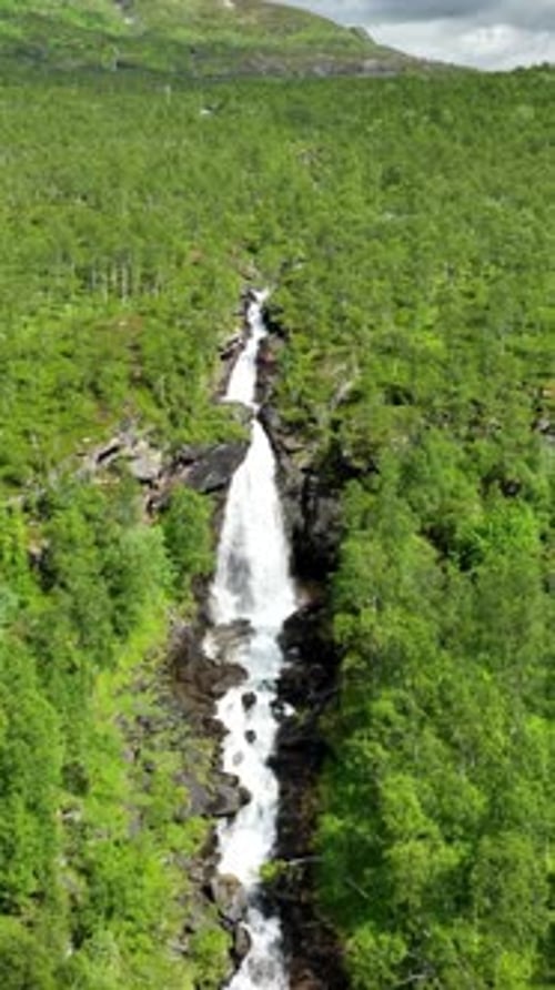 Aerial of Meelva Waterfall in Norway. Vertical video.
