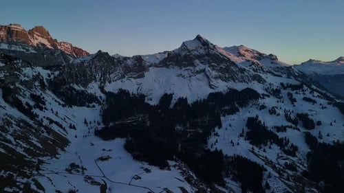 Snow covered winter mountain alpine landscape Switzerland cold morning